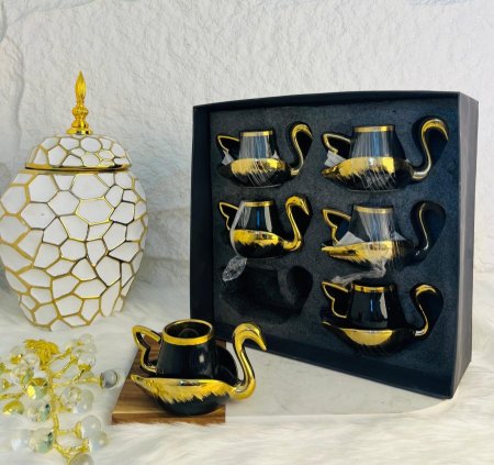 طقم فناجين قهوة اسود وذهبي على شكل بطة يتكون من 12قطعة فخمة