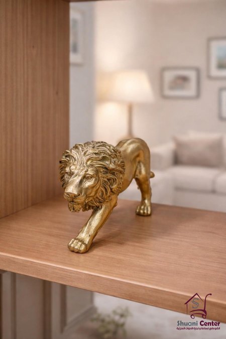 تحفة الاسد بلون الذهبي
